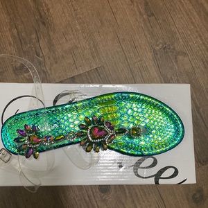 Women sandals, multi colored size 7 slightly used, great condition